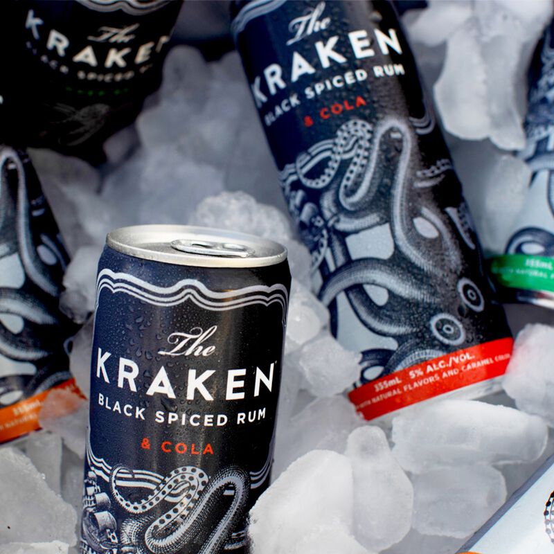 The Kraken Black Spiced Rum & Cola Canned Cocktails on ice